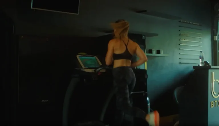 Client running on a treadmill in the BTX studio