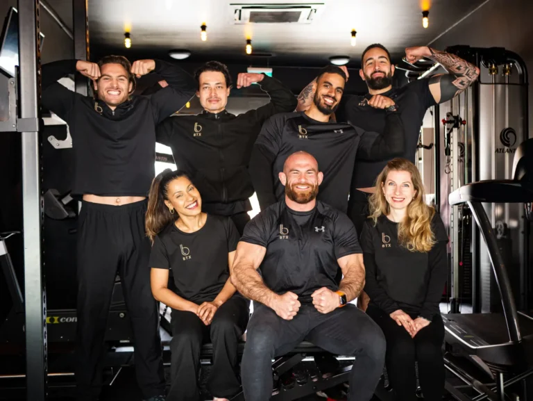 The 7 BTX coaches together in the rig at the Finchley Road studio